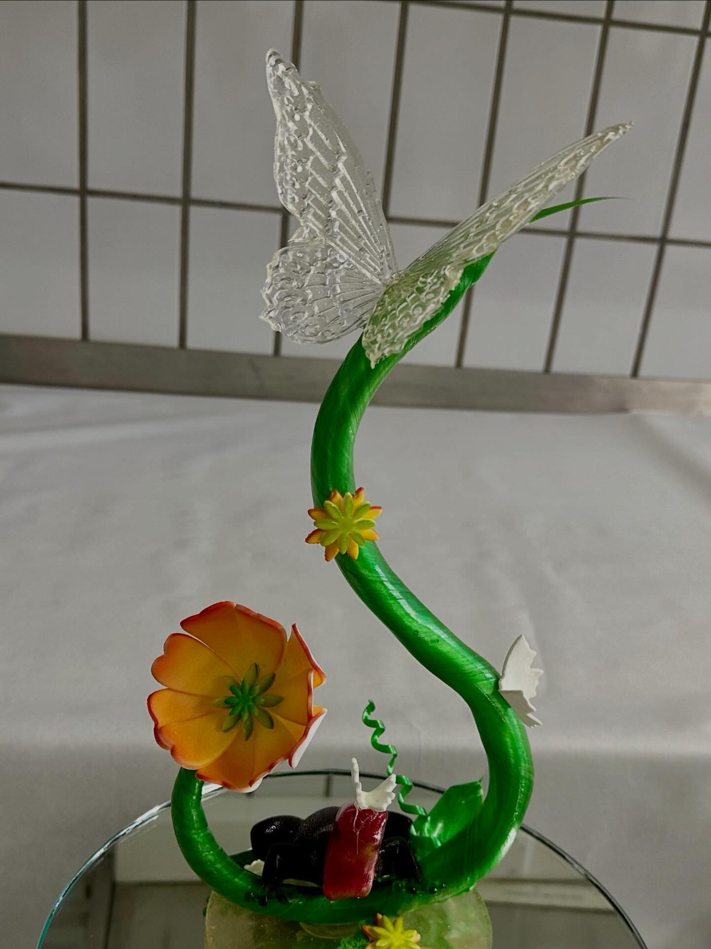 Pulled and blown sugar showpiece with a butterfly